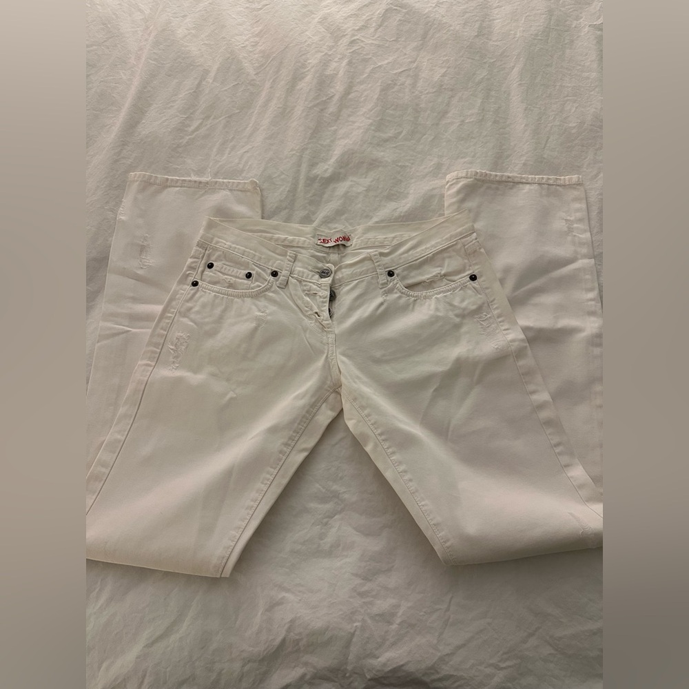 Sexy woman white jeans.